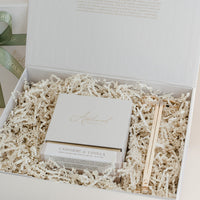 Cashmere & Vanilla luxury candle gift box with gold wick trimmer.