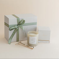 Cashmere & Vanilla luxury candle gift box with gold wick trimmer.