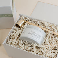 Citrus Grove travel  candle gift box with gold candle snuffer.
